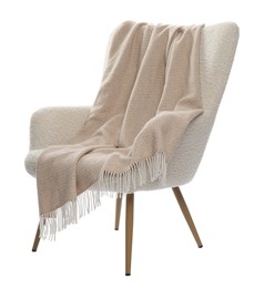 Photo of Comfortable armchair with blanket isolated on white