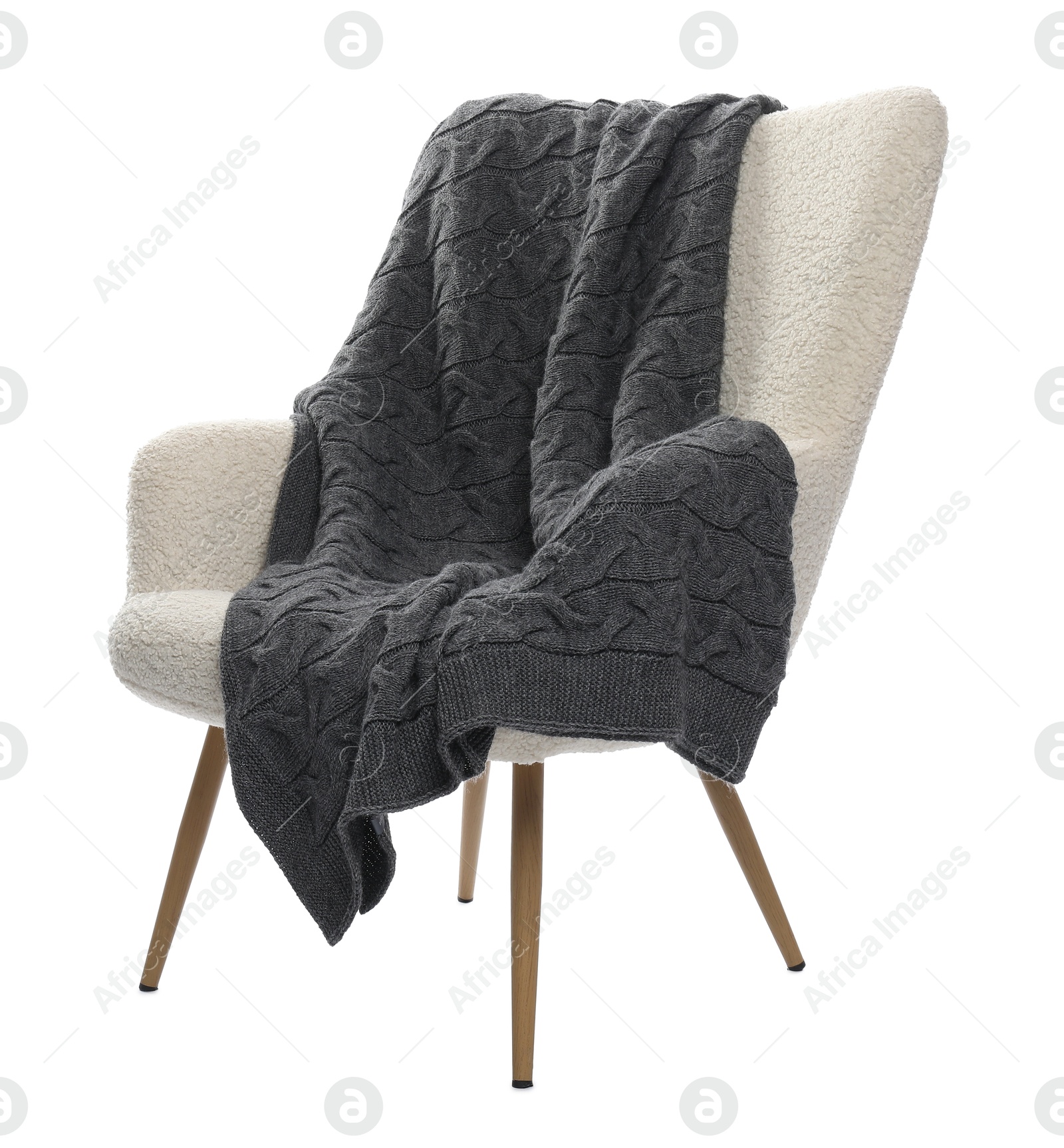 Comfortable armchair with blanket isolated on white Photo of Comfortable armchair with blanket isolated on white