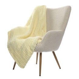 Photo of Comfortable armchair with blanket isolated on white