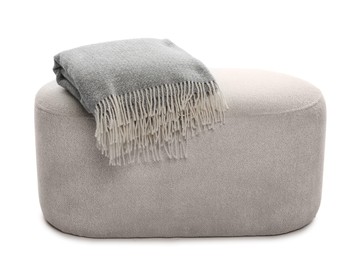 Photo of Pouf with folded blanket isolated on white