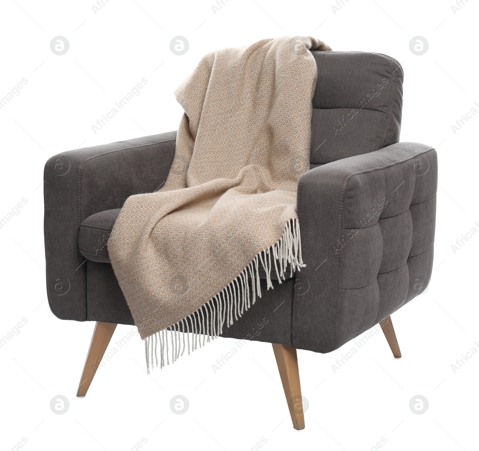 Comfortable armchair with blanket isolated on white Photo of Comfortable armchair with blanket isolated on white