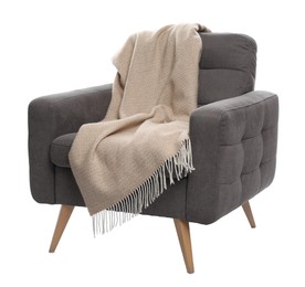Photo of Comfortable armchair with blanket isolated on white