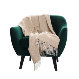Photo of Comfortable armchair with blanket isolated on white
