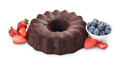 Photo of Tasty chocolate bundt cake with berries isolated on white