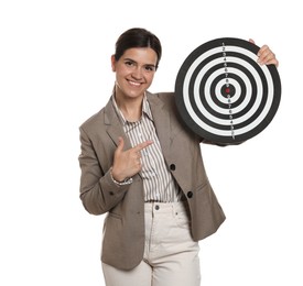 Photo of Targeting. Smiling businesswoman pointing at dart board on white background