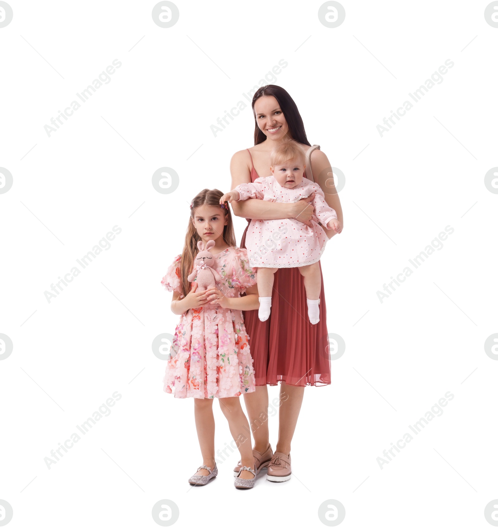 Mother and her cute kids on white background Photo of Mother and her cute kids on white background
