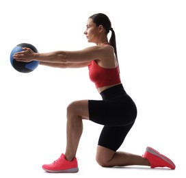Photo of Athletic woman exercising with medicine ball on white background