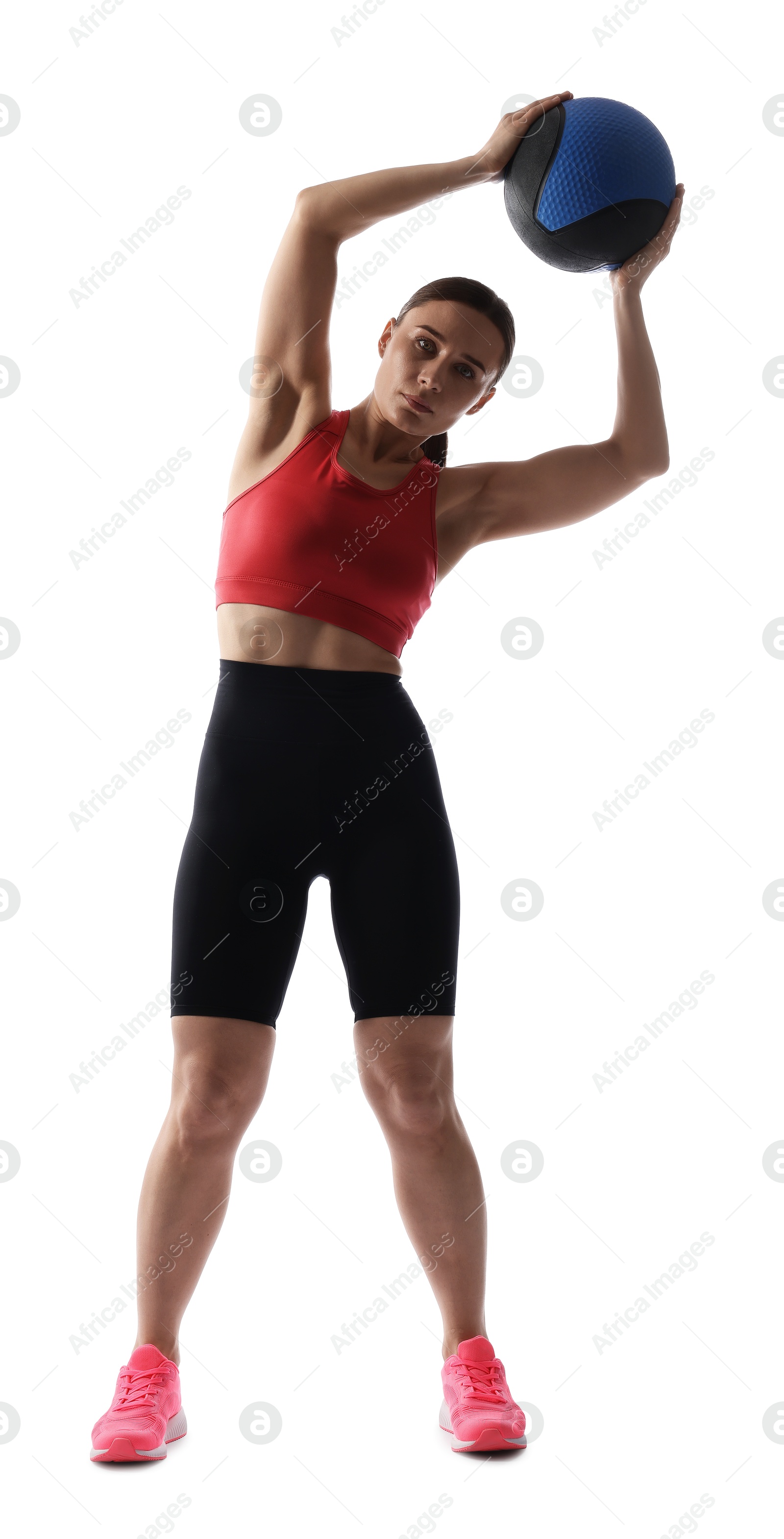 Athletic woman exercising with medicine ball on white background Photo of Athletic woman exercising with medicine ball on white background