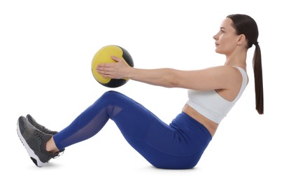 Photo of Athletic woman exercising with medicine ball on white background