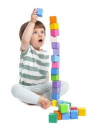 Photo of Cute little child playing with colorful cubes on white background