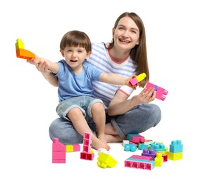 Photo of Mother and son playing with building bricks on white background