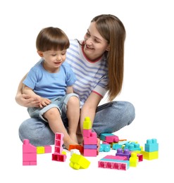 Photo of Mother and son playing with building bricks on white background