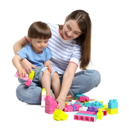 Photo of Mother and son playing with building bricks on white background