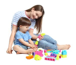 Photo of Mother and son playing with building bricks on white background
