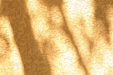 Photo of Orange textured surface as background, closeup view