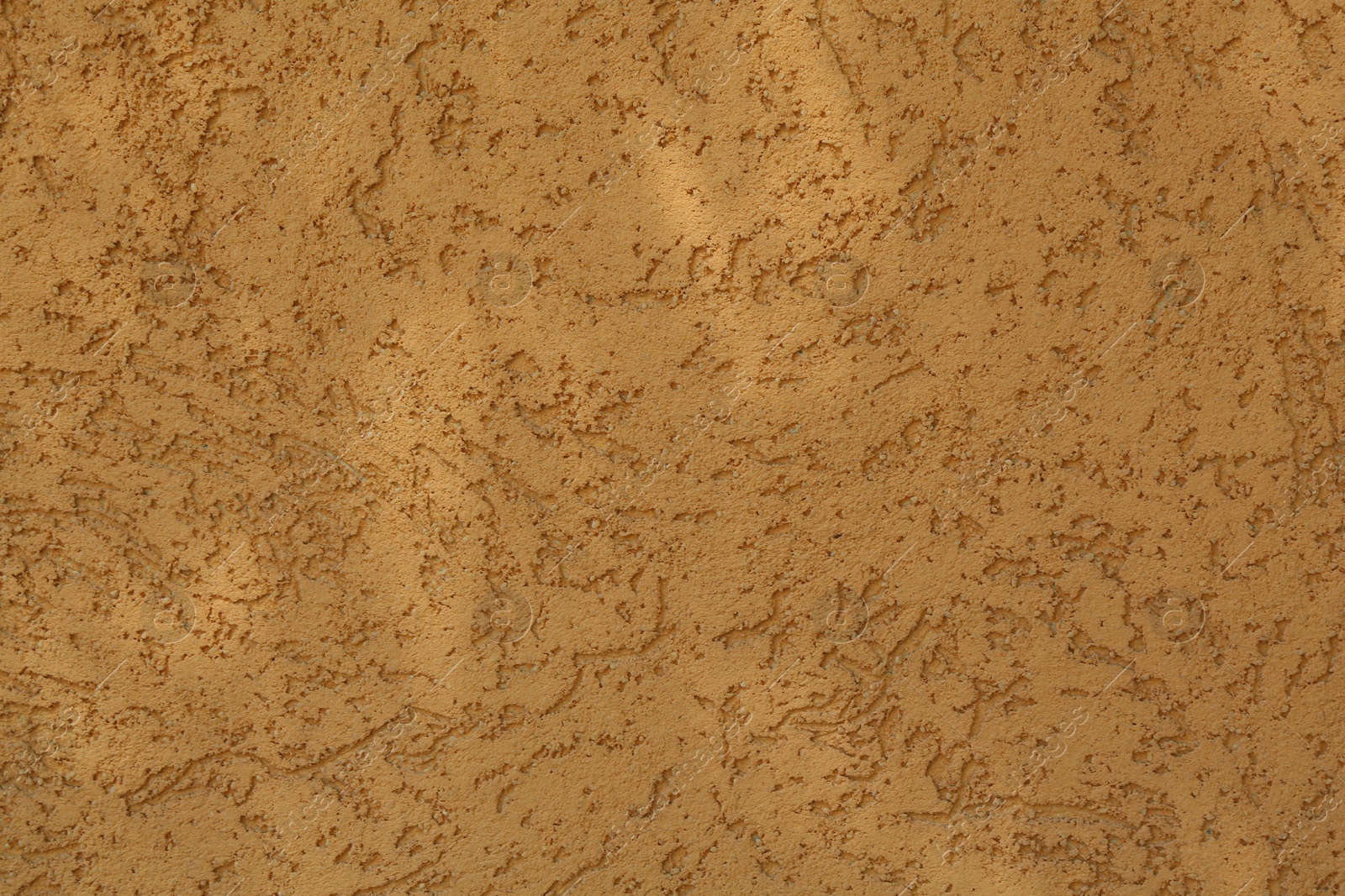 Orange textured surface as background, closeup view Photo of Orange textured surface as background, closeup view