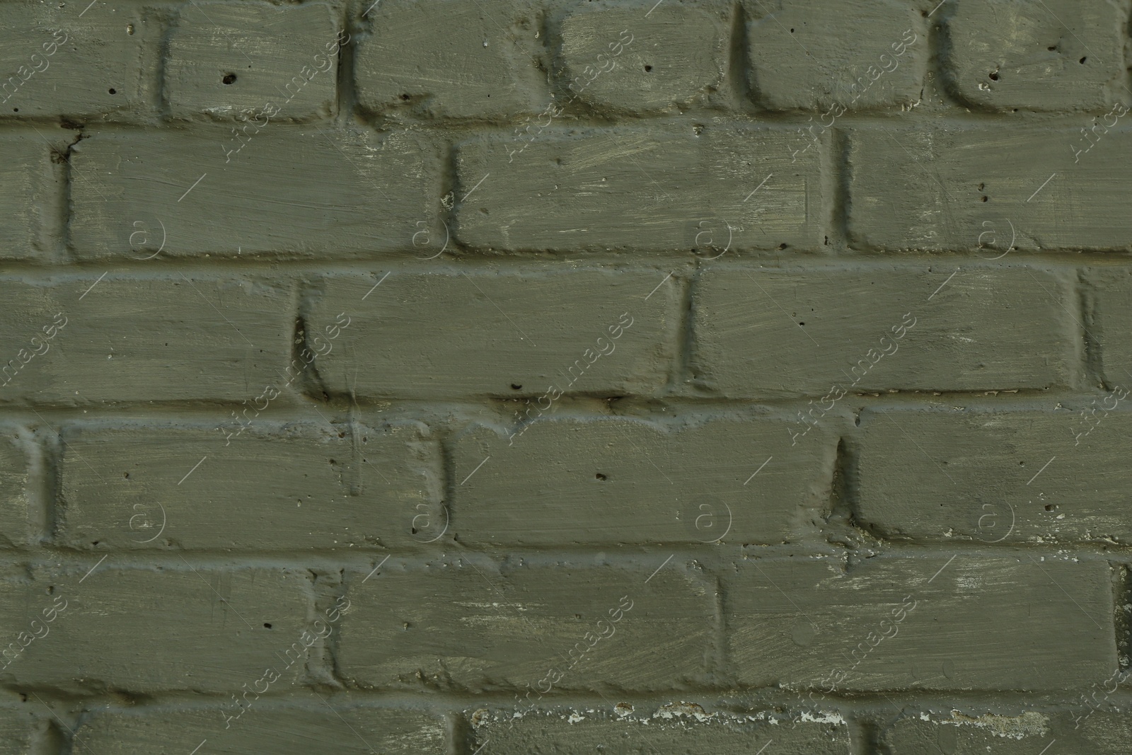 Green brick wall as background, closeup view Photo of Green brick wall as background, closeup view