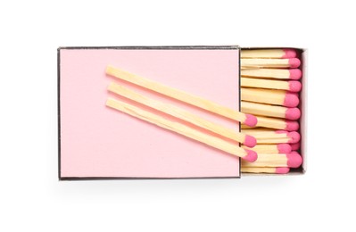 Photo of Matches and pink box isolated on white, top view