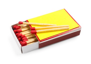 Photo of Matches and yellow box isolated on white
