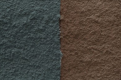 Photo of Color textured wall as background, closeup view