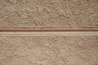Photo of Stone textured wall as background, closeup view