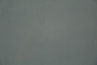 Photo of Grey cement textured surface as background, closeup