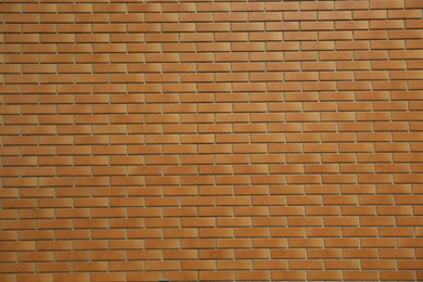 Photo of Color brick wall as background, closeup view