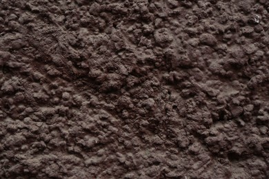 Photo of Brown textured surface as background, closeup view