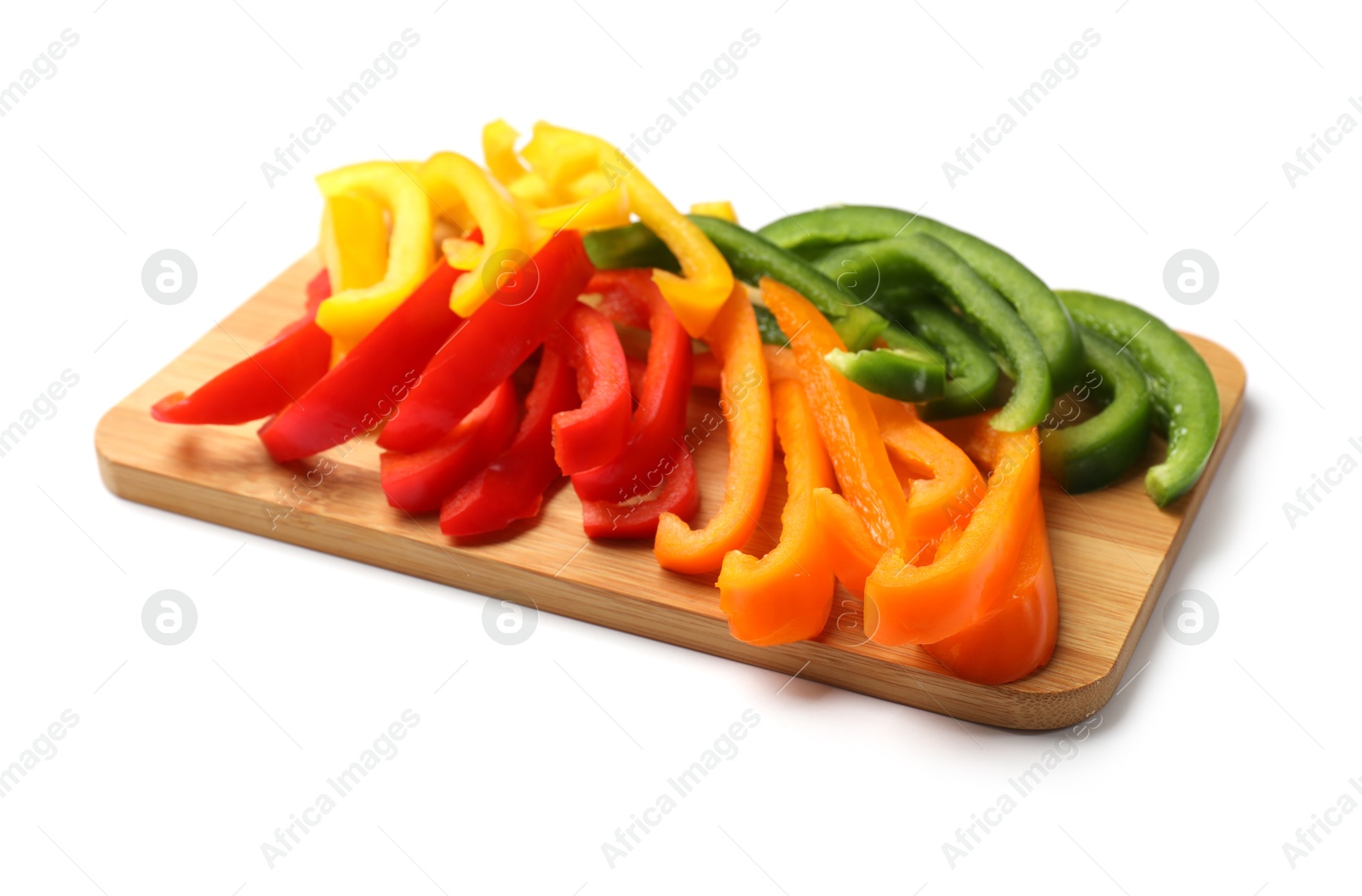 Cut colorful bell peppers isolated on white Photo of Cut colorful bell peppers isolated on white