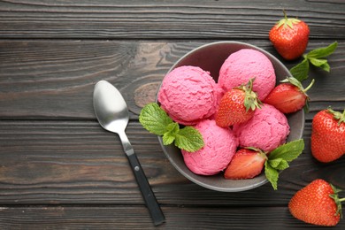 Photo of Tasty sorbet with strawberries and mint served on wooden table, flat lay