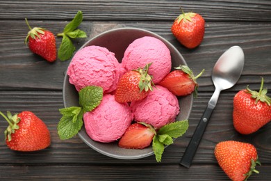 Photo of Tasty sorbet with strawberries and mint served on wooden table, flat lay