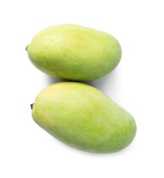Photo of Two sweet fresh mangos isolated on white, top view