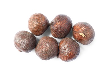 Photo of Many ripe salak fruits isolated on white, top view