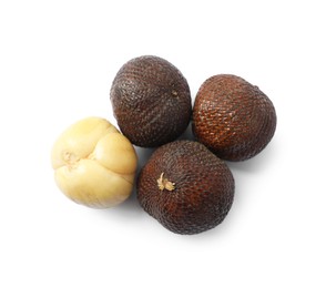 Photo of Many ripe salak fruits isolated on white, top view