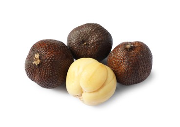 Photo of Many ripe salak fruits isolated on white