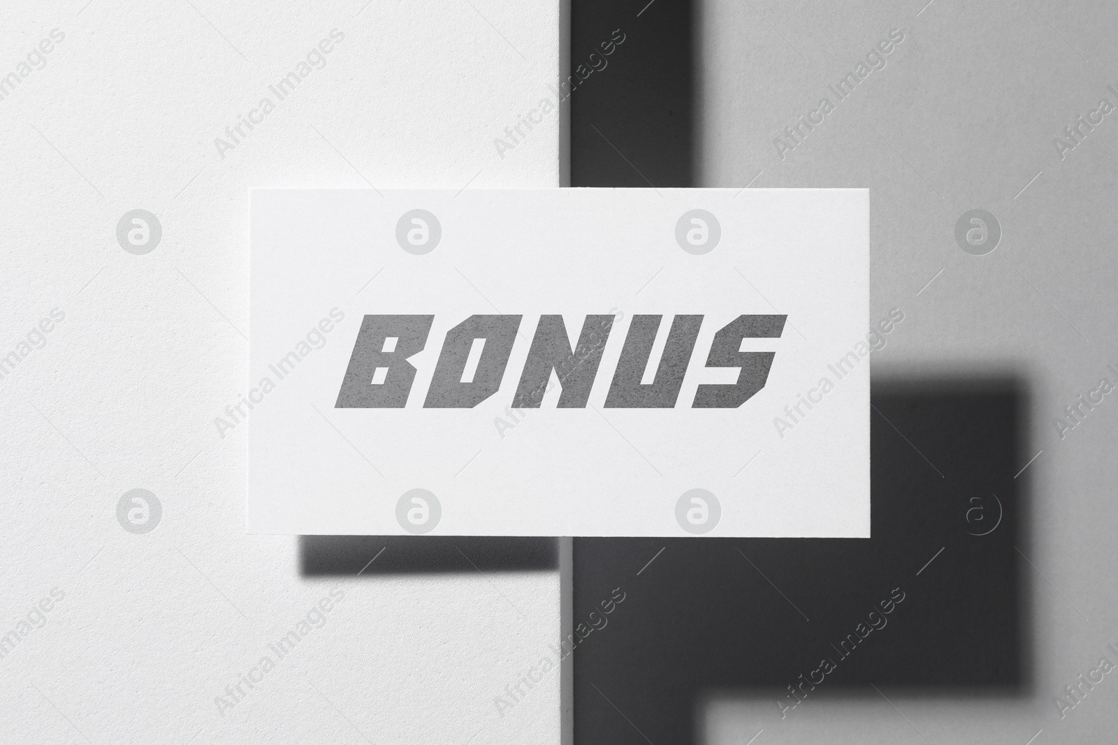 Bonus card on white background, top view Image of Bonus card on white background, top view