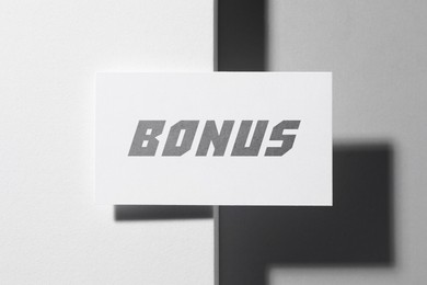 Image of Bonus card on white background, top view