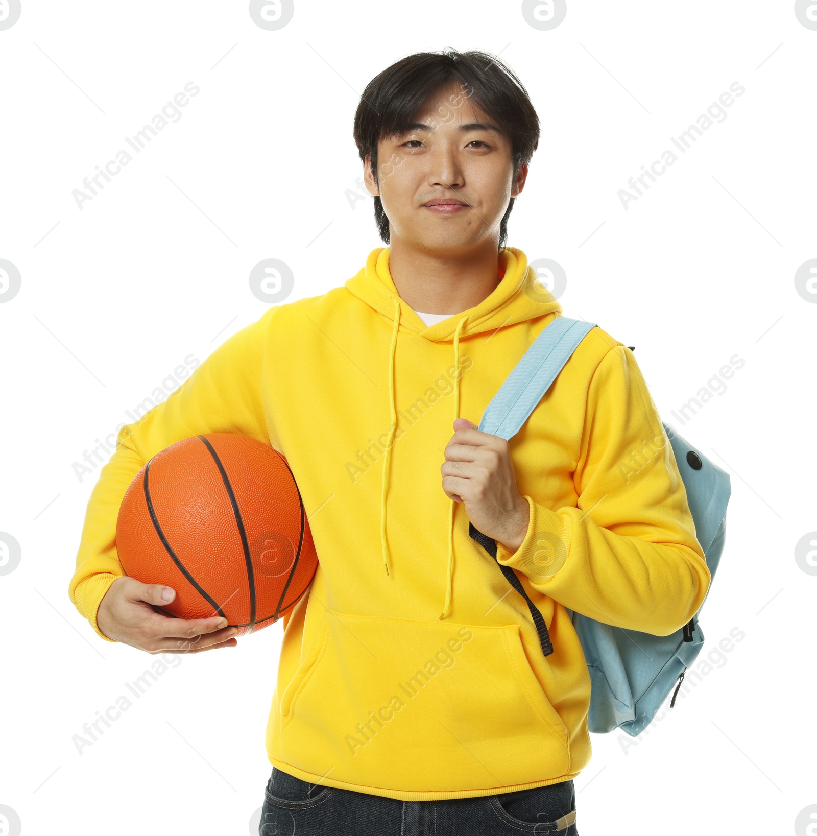 Student with basketball ball and backpack on white background Photo of Student with basketball ball and backpack on white background