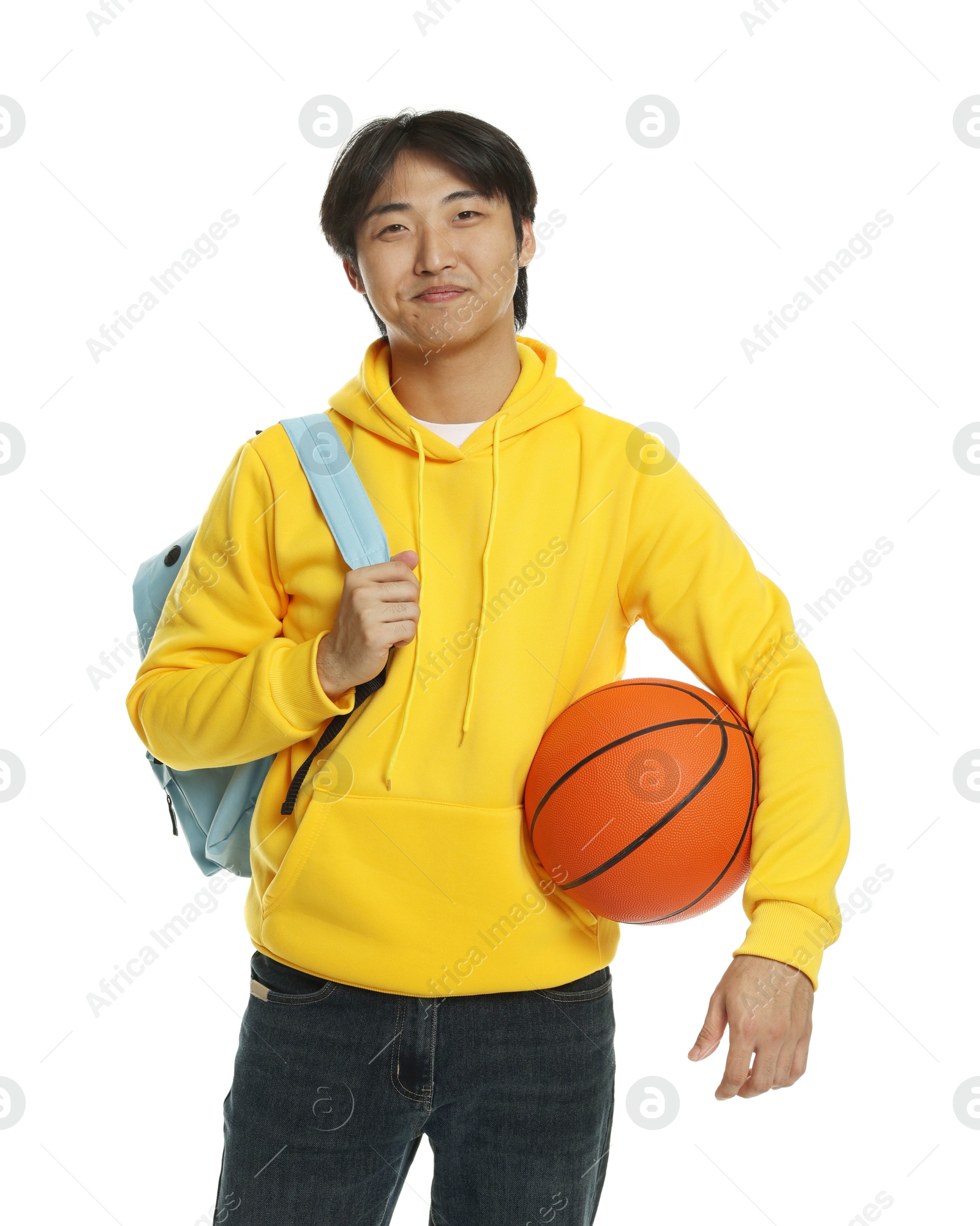 Student with basketball ball and backpack on white background Photo of Student with basketball ball and backpack on white background