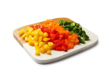 Photo of Cut colorful bell peppers isolated on white