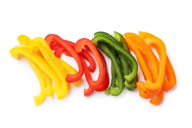 Photo of Cut colorful bell peppers isolated on white, top view