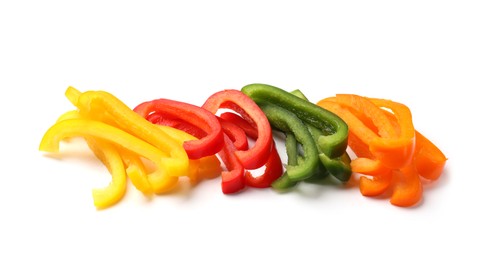 Photo of Cut colorful bell peppers isolated on white
