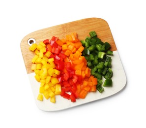 Photo of Cut colorful bell peppers isolated on white, top view