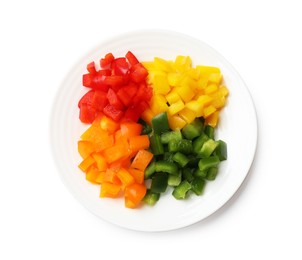 Photo of Cut colorful bell peppers isolated on white, top view