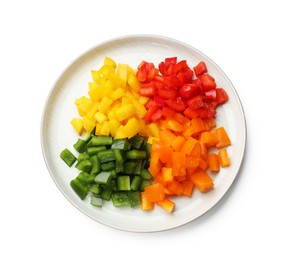 Photo of Cut colorful bell peppers isolated on white, top view