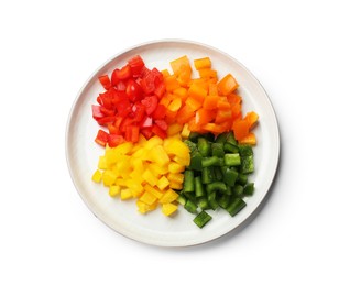 Photo of Cut colorful bell peppers isolated on white, top view