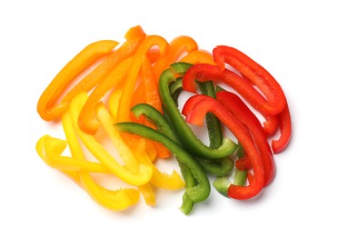 Photo of Cut colorful bell peppers isolated on white, top view