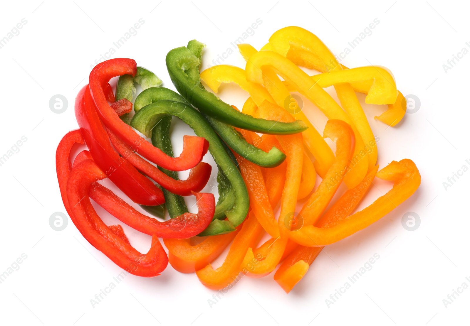Cut colorful bell peppers isolated on white, top view Photo of Cut colorful bell peppers isolated on white, top view