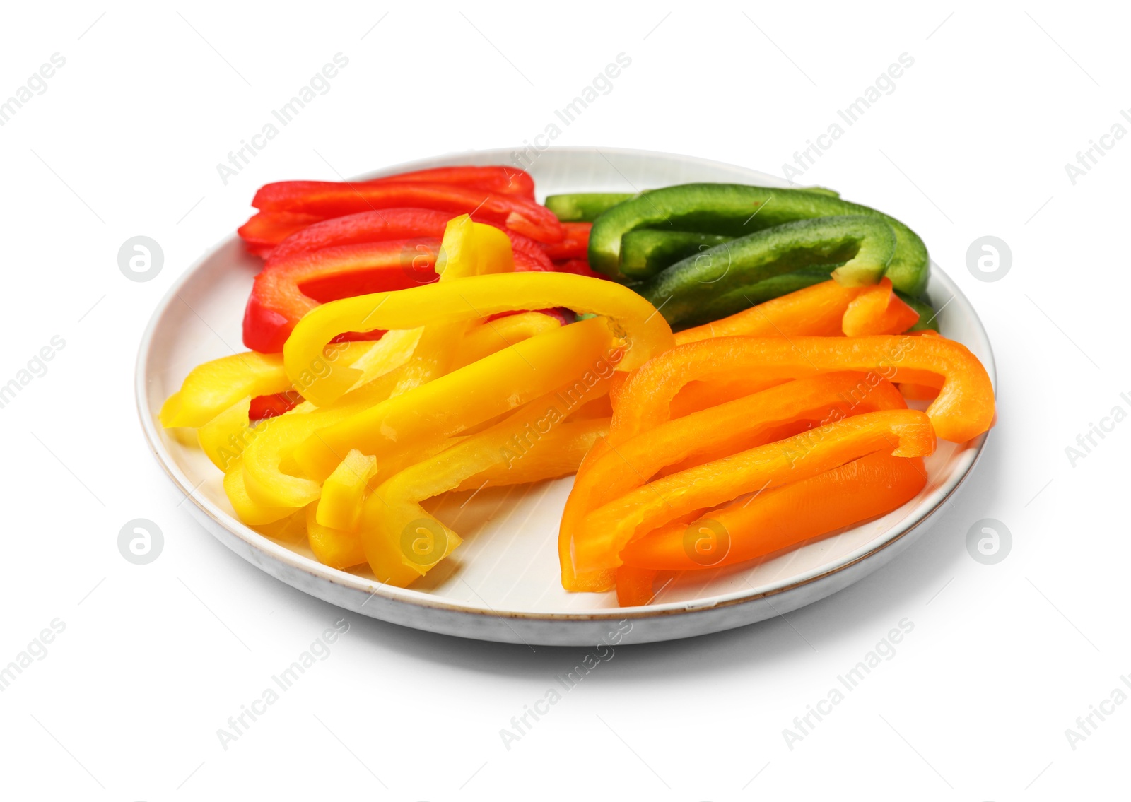 Cut colorful bell peppers isolated on white Photo of Cut colorful bell peppers isolated on white
