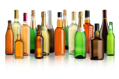Image of Bottles with different types of alcoholic drinks on white background, set